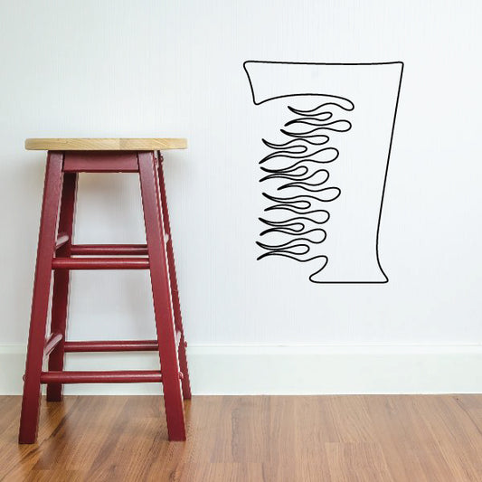 Vinyl decal of number seven with black flame lines on a white shape
