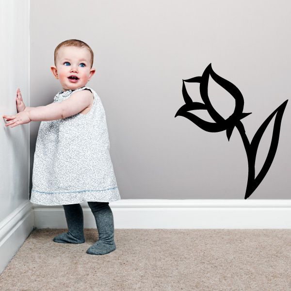 Black lotus-style floral vinyl wall decal with curved petals