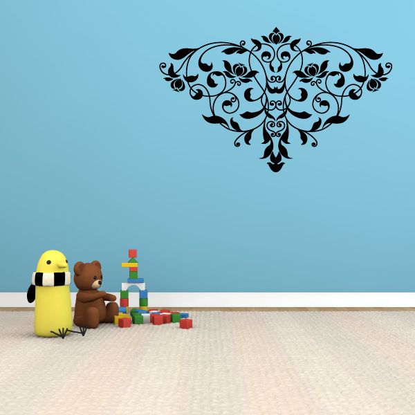 Ornate damask wall decal with symmetrical scrollwork in dark ink