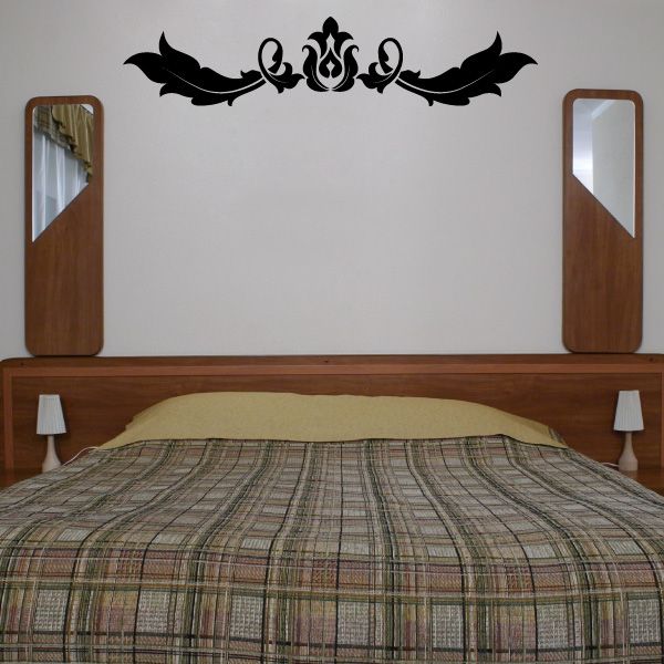 Ornate black vinyl wall decal with two birds and scrolling floral medallion