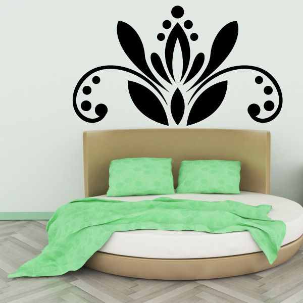 Ornamental floral mandala wall decal with black petals and curling scroll accents