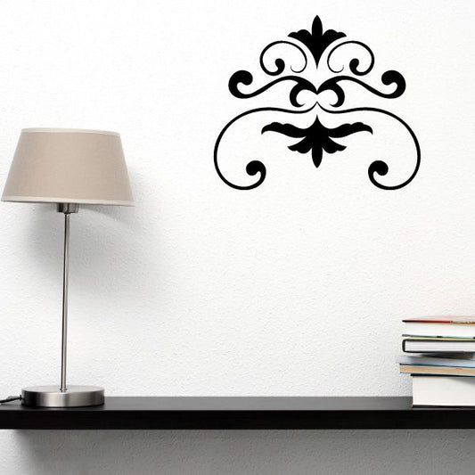 Black ornamental wall decal with scroll and fleur-de-lis motif