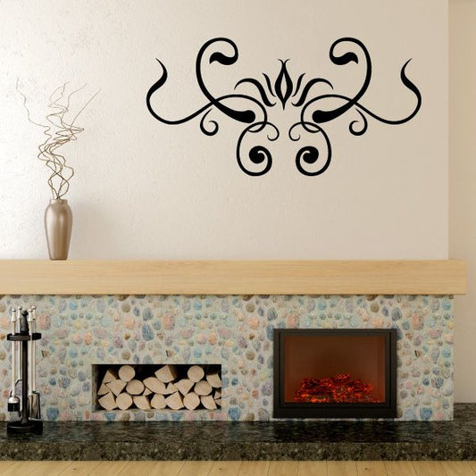 Ornate black swirl vinyl wall decal with floral flourish and curls