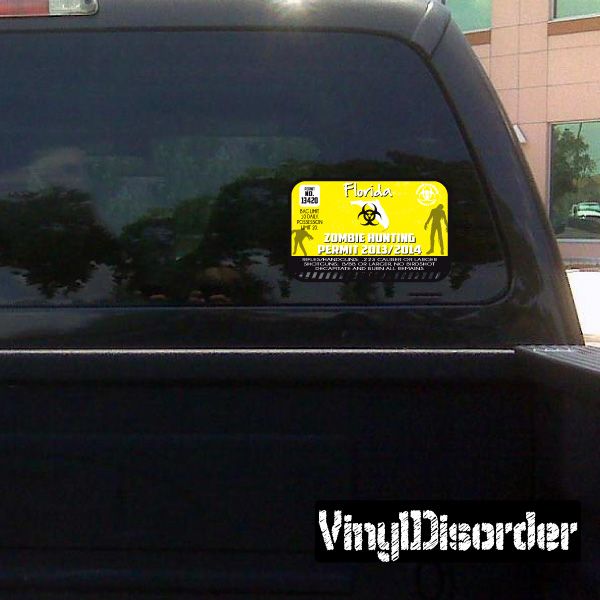 Florida Zombie Hunting Permit sticker on car window, yellow and black with event text