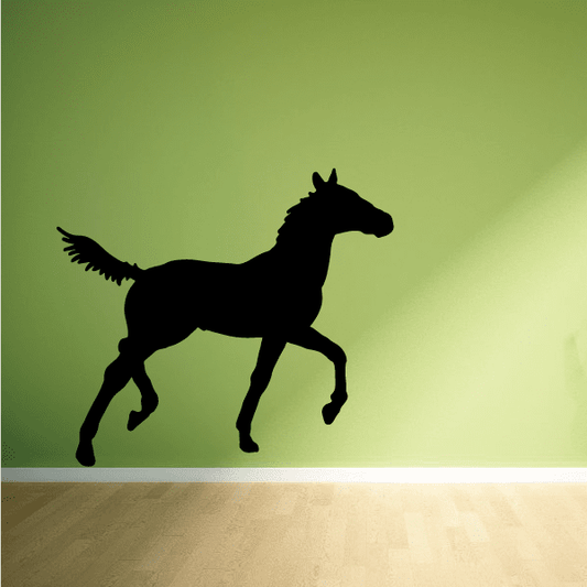 Foal prancing decal with black horse silhouette, side view and raised leg