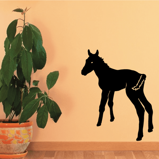 Foal wagging tail decal, black horse silhouette with raised tail and forelock