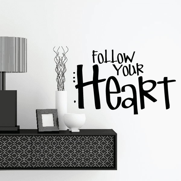 Follow your heart decal with black "Follow Your Heart" lettering