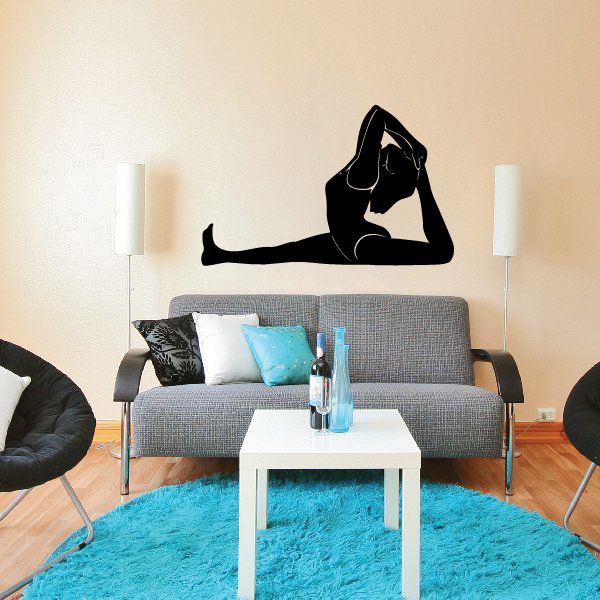 Black fitness wall decal showing a stretching pose with legs behind head.