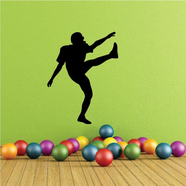 Football player wall decal vinyl silhouette, black standing with arm raised
