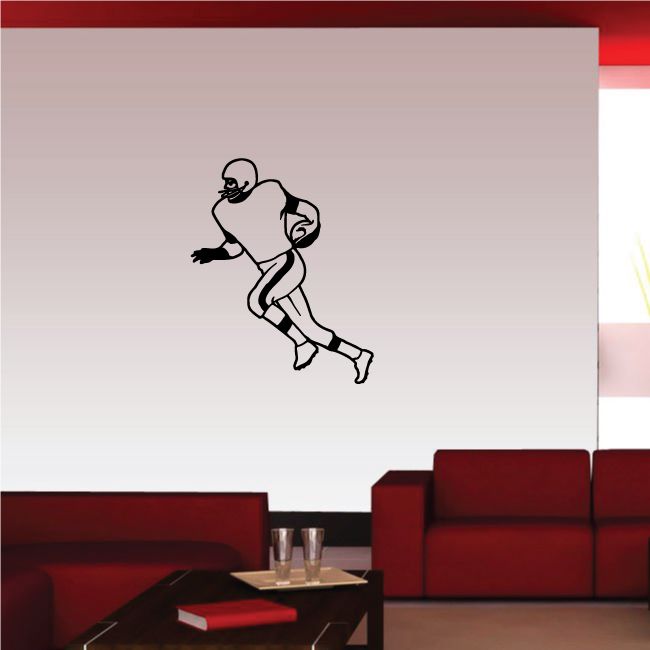 Football wall decal: black football player silhouette running with ball