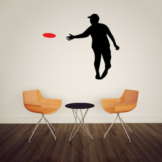 Person tossing frisbee wall decal with red disc and black silhouette figure