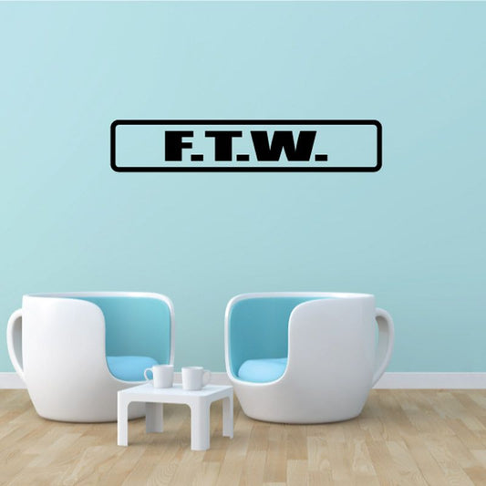 F.T.W. decal with black logo text on white rectangular outline