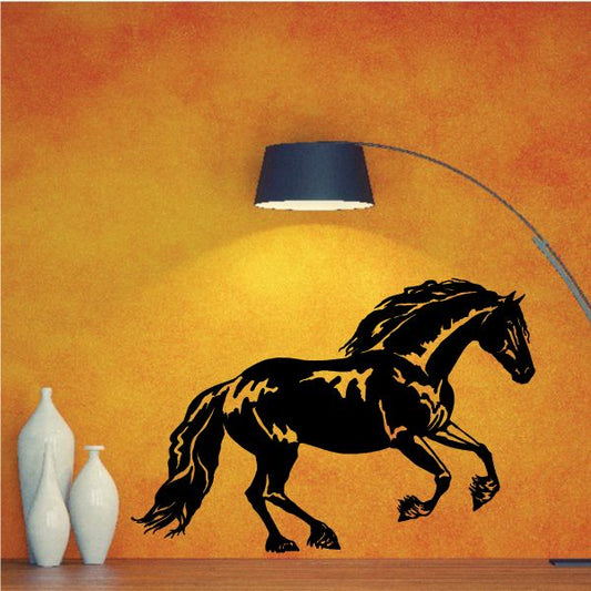 Black galloping stallion wall decal silhouette, horse mid-stride with mane flowing.