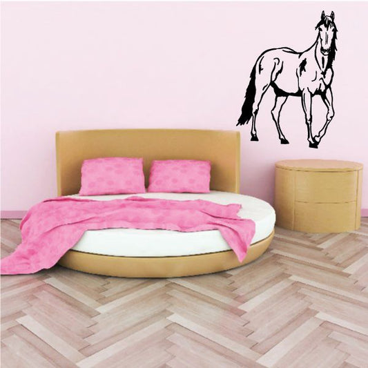 Giddy staring horse wall decal, black outline of rearing horse on pale wall