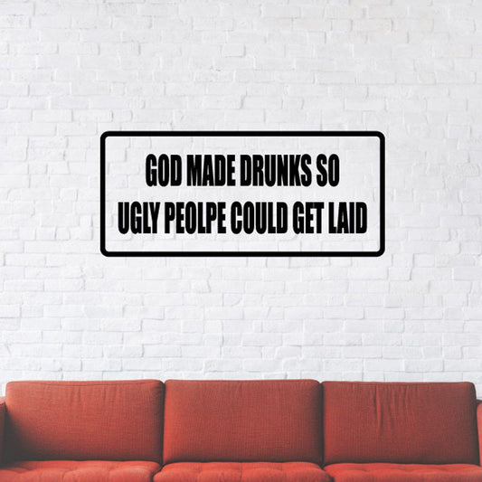 Rectangular wall decal with black border and bold uppercase text, light background