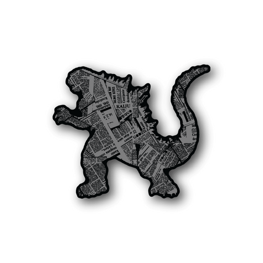 Godzilla die-cut sticker with newspaper collage graphic in black and white