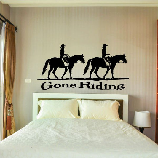 Wall decal with two horse riders and the text 'Gone Riding'