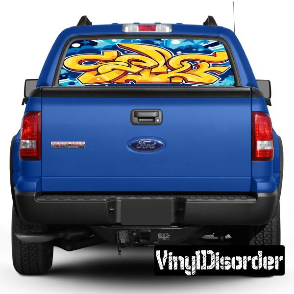 Blue vehicle rear window graffiti graphic through glass