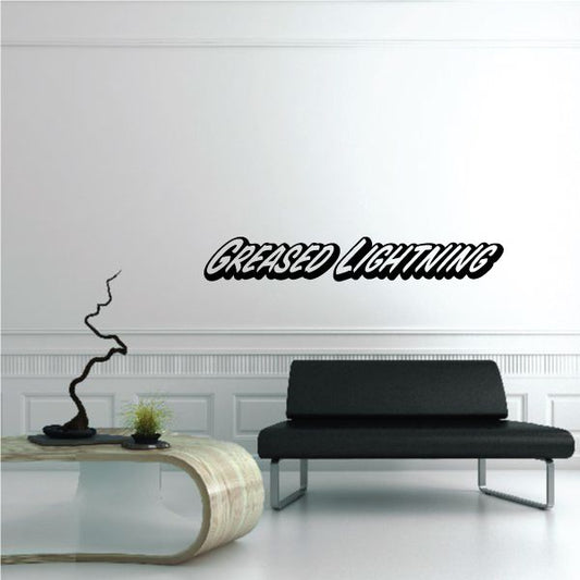 Greased Lightning wall decal with stylized script and lightning bolt outline