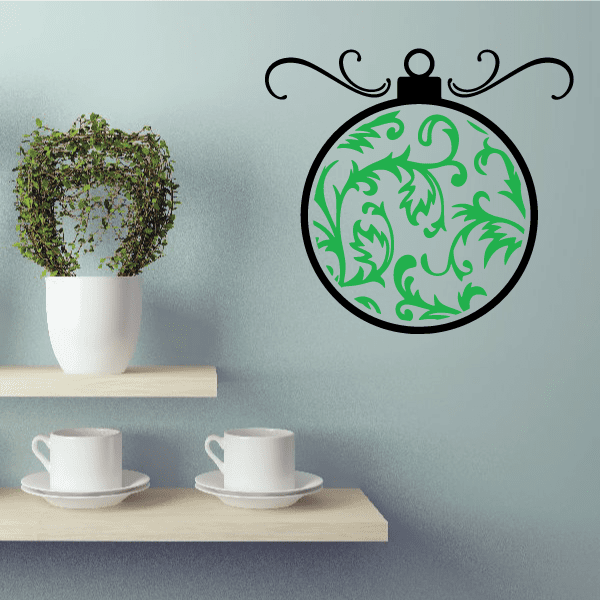 Green vines ornament die-cut decal with round black outline and green foliage pattern