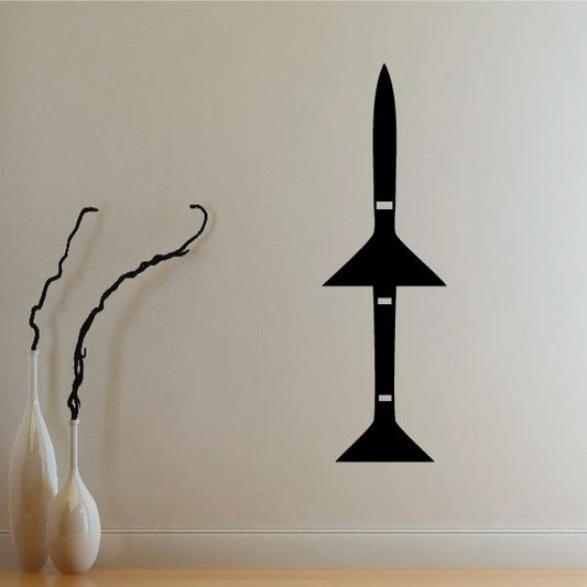 Guided missile decal with black rocket silhouette and three fins