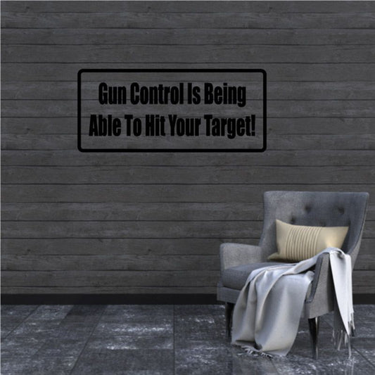 Rectangular black sign decal with text 'Gun Control Is Being Able To Hit Your Target!'