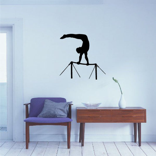 Gymnastics bars wall decal with black gymnast silhouette on metal bars