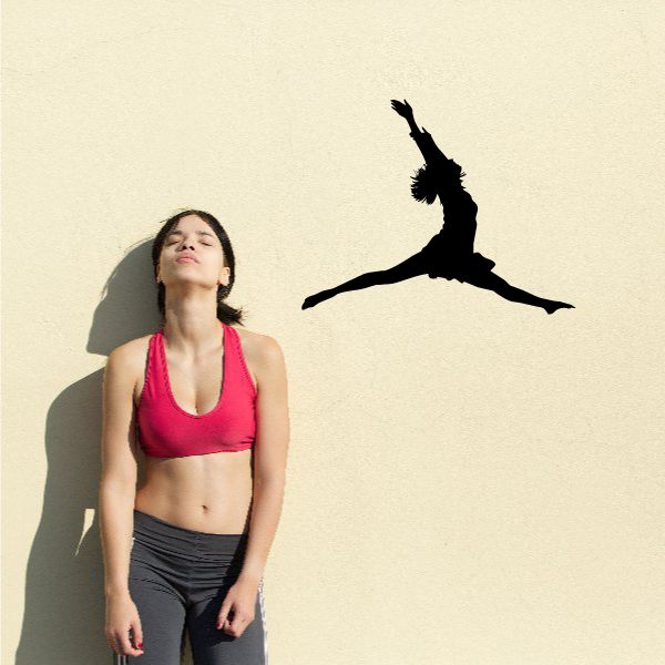 Gymnastics wall decal: black gymnast silhouette performing a jump split