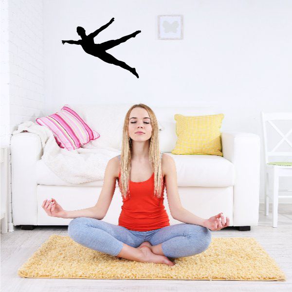 Gymnastics wall vinyl decal, black gymnast silhouette in mid-swing pose