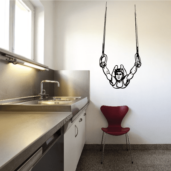 Gymnastics vinyl wall decal: gymnast on hanging rings, black outline