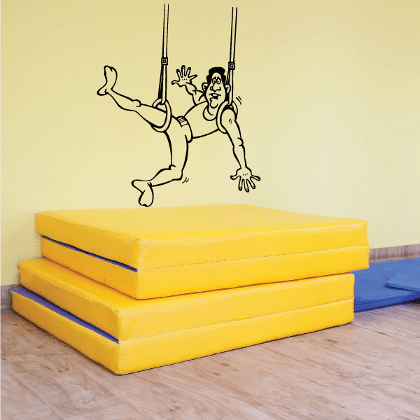 Gymnastics vinyl wall decal with two gymnasts reaching and hanging from bars