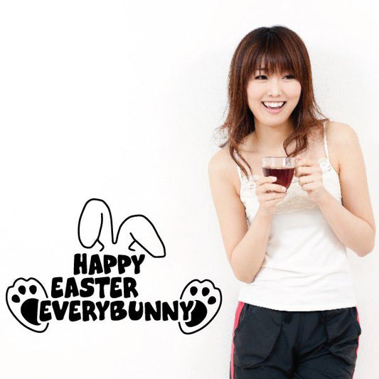 Happy Easter everybunny wall decal with bunny and paw icons, black lettering