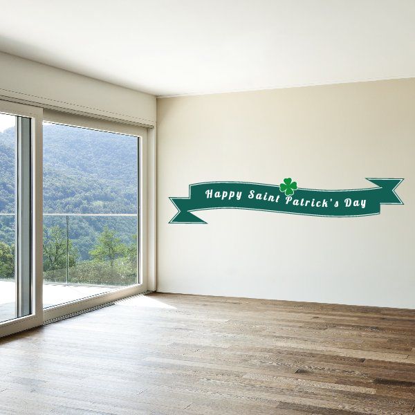 Green St. Patrick's Day ribbon banner sticker with 'Happy Saint Patrick's Day' text