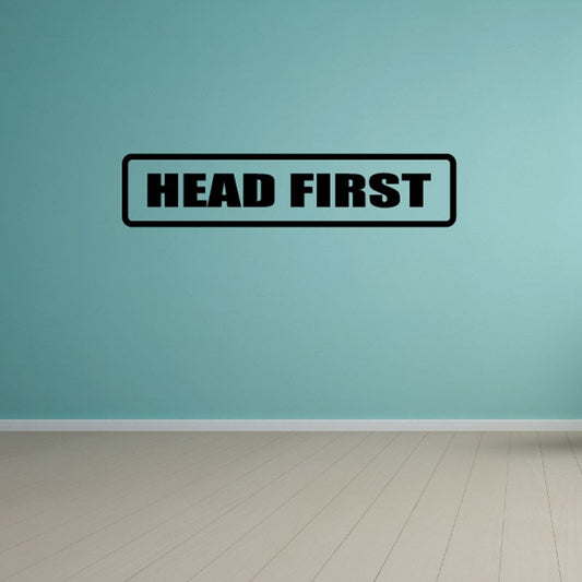 Head First wall decal with black border and bold HEAD FIRST text