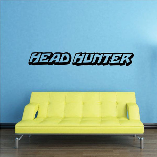 Stylized Head Hunter decal in black and white lettering