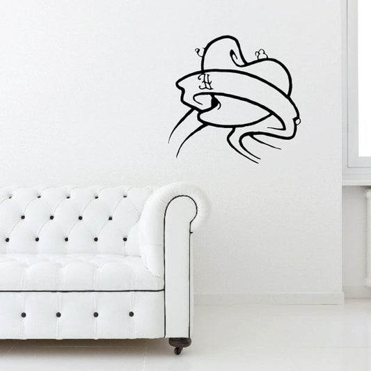 Vinyl wall decal of angel wings and ribbon with heart and cross outline