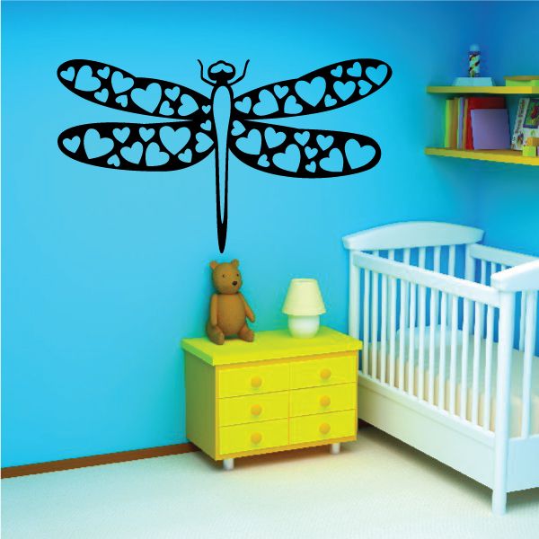 Black dragonfly wall decal with heart cut-out wings and small antenna details