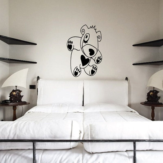 Heart-stuffed bear wall decal, black outline with heart shapes and paw prints