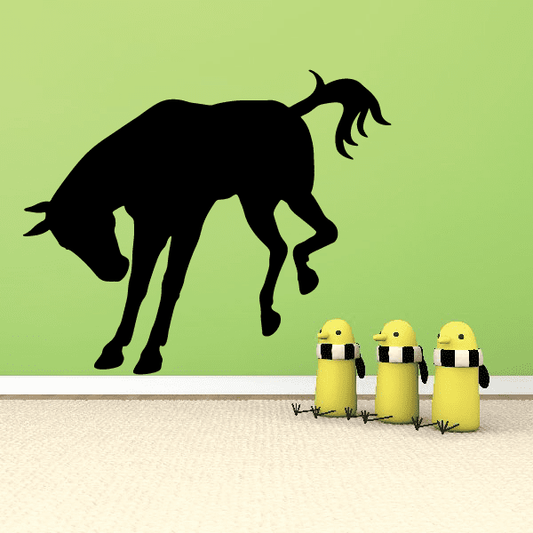 Kicking horse decal with three yellow cactus-like figures