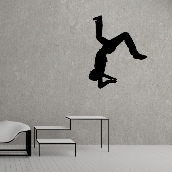 Black hip hop dancer vinyl wall decal silhouette, angled pose on plain surface