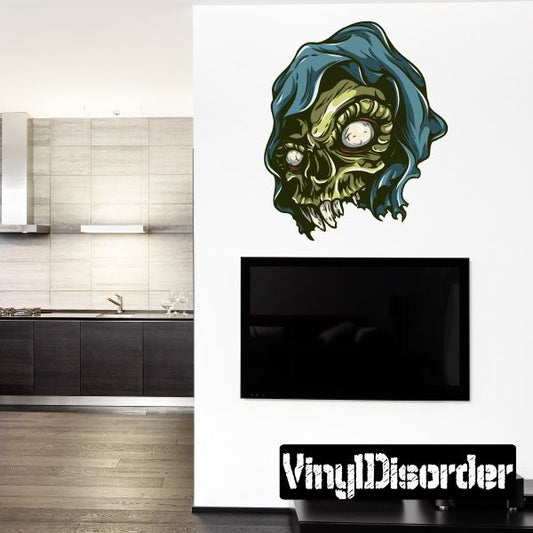 Hooded skull sticker with dark green hood and pale skull face, glossy black outline