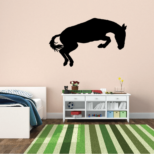 Black horse jumping decal in dynamic motion pose