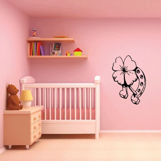 Horseshoe and four-leaf clover wall decal with outlined clover and horseshoe