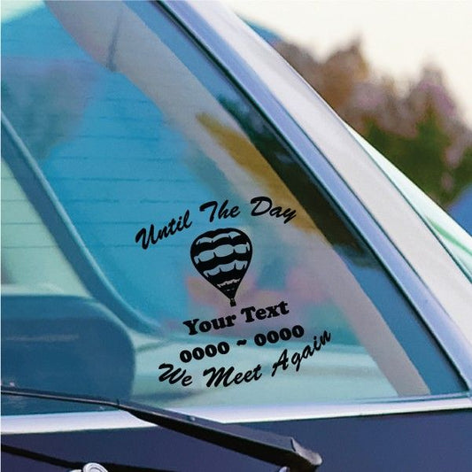 Memorial window decal with hot-air balloon icon and script text, including 'We Meet Again'