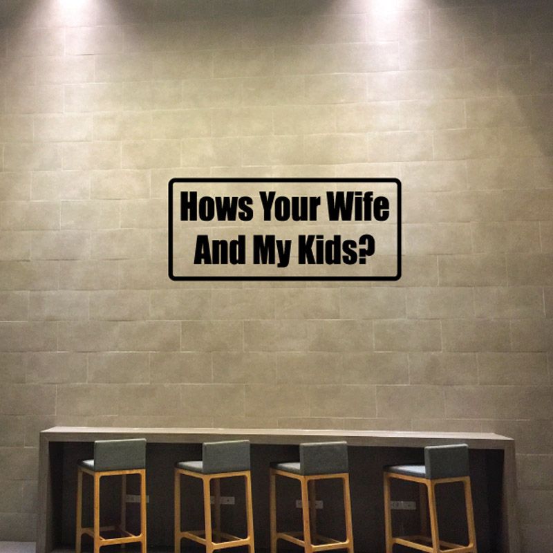 Black rectangular wall decal with white text: How's Your Wife And My Kids?
