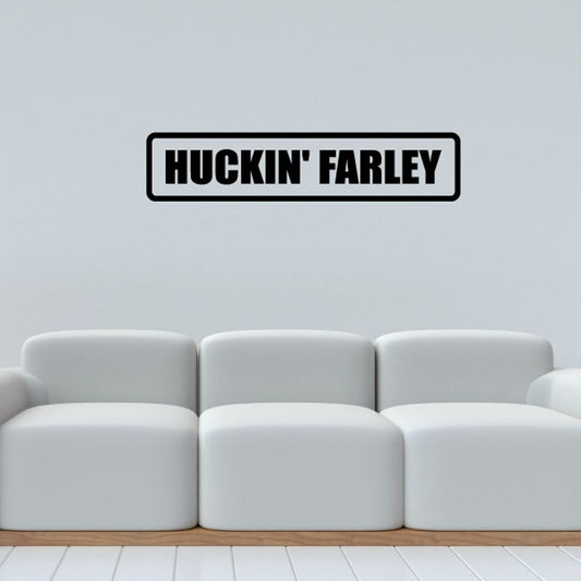 Huckin' Farley logo decal with bold white text inside black border rectangle
