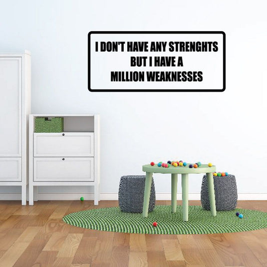 Wall decal with quote: 'I DON'T HAVE ANY STRENGTHS BUT I HAVE A MILLION WEAKNESSES'