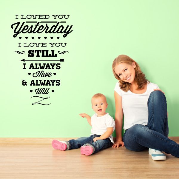 Valentine wall decal with cursive quote: “Yesterday I love you still, always will”