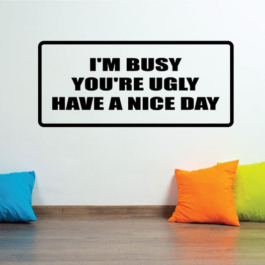 Rectangle wall decal with bold black quote: 'I'm busy you're ugly, have a nice day'.