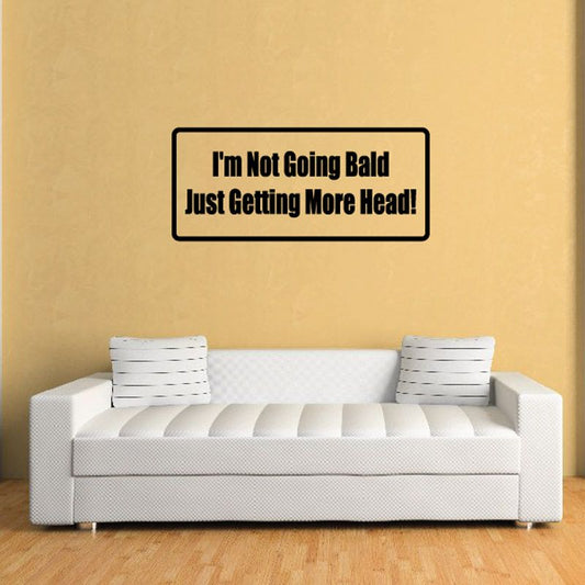 Wall decal with bold quote: "I'm Not Going Bald Just Getting More Head!" in black
